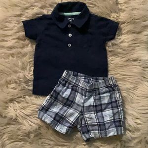 Carter’s short set. Blue plaid pull-up shorts and navy blue pullover shirt 9m.